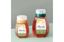 China 300g 500g 1000g Honey Bottles Reflux Inlet Sealing Plastic Seasoning Bottles supplier