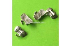 China Manual Metal Orthodontic Molar Brackets with Roth/MBT/Edgewise Hooks Professional Design supplier