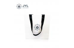 China RoHs Embossing Recycled Paper Gift Bags With Handles Antibacterial Rectangle supplier