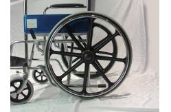 China Solid Castor Folding Steel Wheelchair Fixed Armrest And Footrest supplier