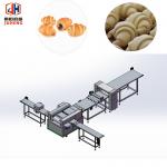 Industrial Unbaked Croissant Making Machine Butter Croissant Dough Cutter Equipment for sale