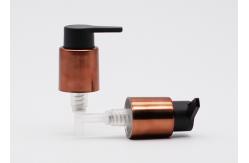China Bronze Glossy Closure 24mm Cosmetic Treatment Pumps With Matte PP Pump Head supplier
