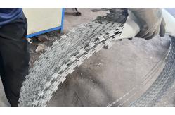 China Galvanized Security Fencing Razor Barbed Wire With Clips Cross supplier