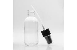China Liquid 120ml Clear Boston Glass Bottles With Pump Spray supplier