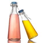 Wholesale 250Ml 500Ml Round Glass Juice Bottles Glass Drinks Bottle With Lid for sale