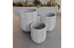 China Textured Surface Round Fiber Clay Planter D480*H480 For Elegant Plant Arrangements supplier