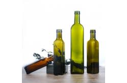 China In Stock 250Ml 500Ml 750Ml Round Glass Oil Bottles With Lid supplier