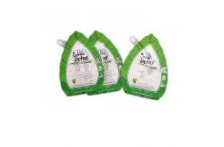 China Custom Printed Design Green Irregular Spout Pouch Packaging With Foil supplier