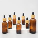 Glossy Amber Color Bamboo Essential Oil Glass Dropper Bottle Wood Cap Glass Cosmetic Containers for sale