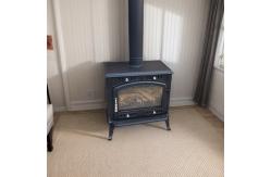 China Custom antique cast iron coal stove designed cast iron wood burning stove supplier