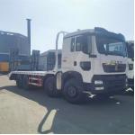 Large Capacity12 Wheels 20ton 25ton Excavator Transfer Howo Flat Bed Transport Truck for sale