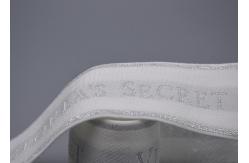China Clothing Customized 35mm White Jacquard Elastic Tape With Shiny Silver Logo supplier