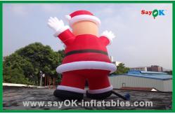 China Custom Red Inflatable Christmas Santa Claus With Bread Inflatable Cartoon Character supplier