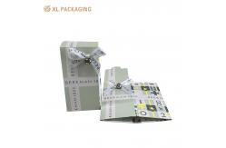 China Cardboard Paper Foldable Card Box Folder Lip Packaging Box With Ribbon Bow supplier