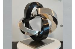China Abstract Black Polished Granite 316 Stainless Steel Sculpture 41cm High supplier