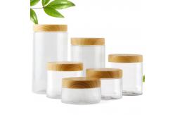 China Cosmetic Clear Plastic Storage Jar Empty Refillable With Bamboo Cap supplier