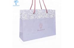 China Portable Kraft Paper Bags With Rope Handles Glossy Lamination supplier