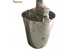 China 4 Frames Stainless Steel Electric Honey Extractor With Stands And Honey Gate supplier