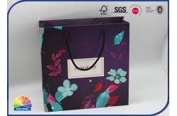 China 4C Printed Paper Packaging Special Bag Matte Lamination With Nylon Handle supplier