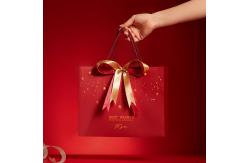 China Customized Printed Red Christmas Paper Bags with Ribbon Bow supplier
