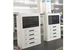 China 4 Electric Lockers Wall Mount Cell Phone Charging Station Kiosk With Advertising Screen supplier