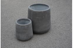 China Modern Round Fiber Clay Planter with Customed Design and Drainage Holes supplier