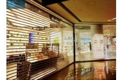 China 5m Width PVC Clear Vision Roller Shutters For Commercial Shop supplier
