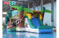 China Jurassic Dinosaur Inflatable Bounce House Water Slide For Kids Playground supplier