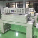 China Automatic Film Shrink Wrapping Machine Heat Tunnel Tube Wrap Packaging Machine for sale