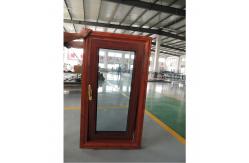 China Windproof Tilt And Turn UPVC Window Oak Finish supplier