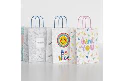 China Christmas Custom Print Logo Kraft Paper Shopping Bags With Handles supplier