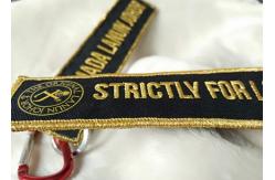 China 2.5cm 3D Gold Embroidery Logo Keychains supplier