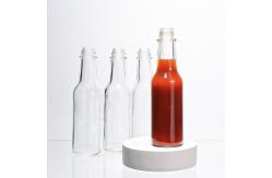 China 5oz 150ml Hot Sauce Woozy Glass Bottle With Leak Proof Screw Cap supplier