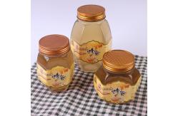China Metal Lid Glass Honey Jar Hexagon Shape Recyclable Food Storage Container supplier