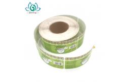 China Custom Waterproof Printed Self Adhesive Labels On A Roll For Water Bottle supplier