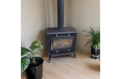 China Custom antique cast iron coal stove designed cast iron wood burning stove supplier