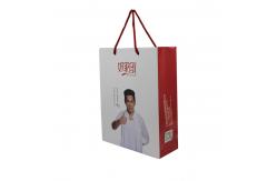 China Small Business Logo Printed White Paper Bags with Custom Logo and Black Handle supplier
