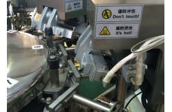 China Full Automatic Ss316L Rotary Packing Machine 380V Rotary Cup Sealing Machine supplier