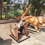 3D Fiberglass Realistic Looking Dinosaurs Struggled Pterosauria Statue Outdoor for sale