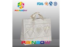 China Unique Design White / Red Custom Printed Paper Bags With Handle supplier