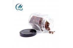 China Food Grade Empty Clear Hexagonal Square Glass Empty Food Storage Jars supplier