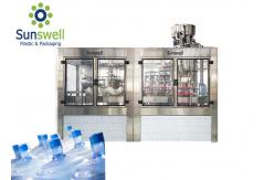 China Rotary PET Bottle Filling Machine Mineral Water Rinsing Washing And Capping supplier