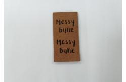 China Suede Microfiber PU Leather Label Washable With Embossed Logo supplier