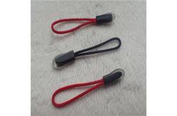 China Outside Wear Zip Fastener Puller With Transparent Outline Border supplier