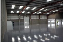 China Prefab Steel Garage Lightweight Warehouse Construction Materials supplier