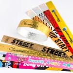 Disposable Golden Star Pattern Logo Text Printed Wristband Unisex Fashionable Holographic Appearance