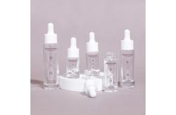 China Custom Logo Transparent Oil Dropper Glass Bottle For Serum Hair Oil supplier