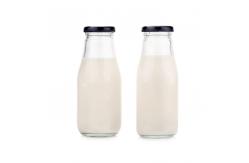 China In Stock 1000Ml 750Ml Portable Juice Milk Glass Bottles With Lid supplier