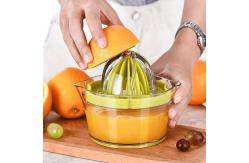 China Manual Bulk Kitchen Supplies Orange Lemon Squeezer Juicer With Measuring Cup Grater supplier