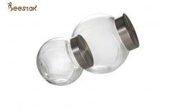 China 50ml Honey Jar And Spoon Flat Bottle With Metal Lid supplier